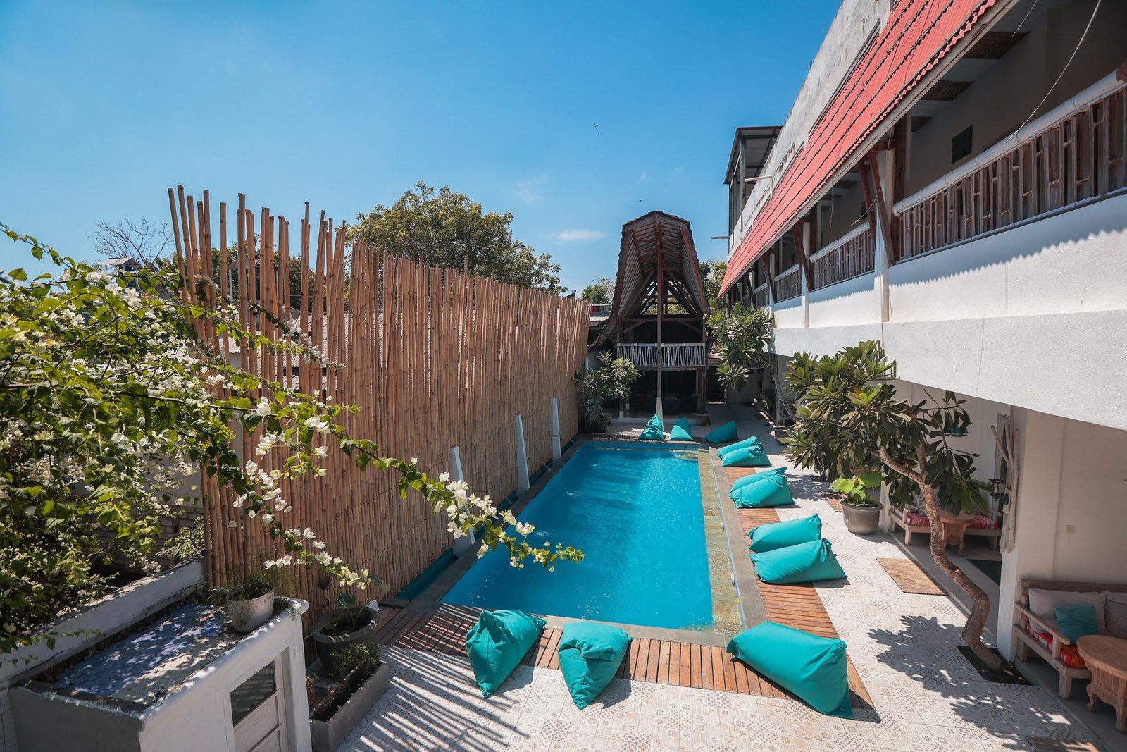The pool and garden at The 5 Brothers Hotel
