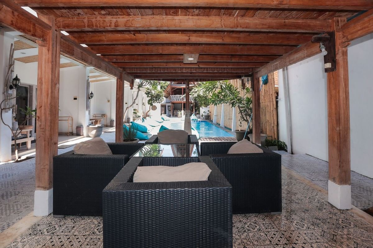 Loungers and bean bags beside the pool
